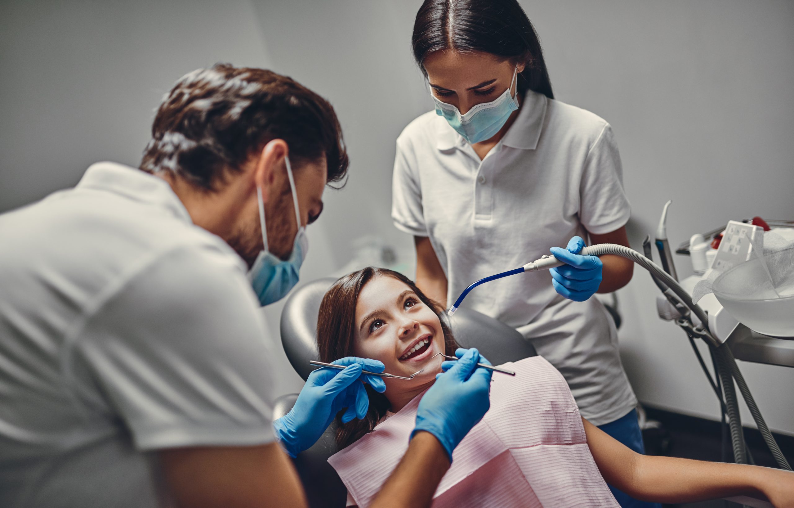 Child happy during her dental treatment